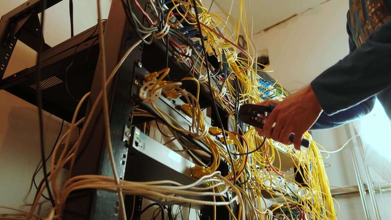 Network engineer in data center - Networking service. network engineer administrator checking server ...